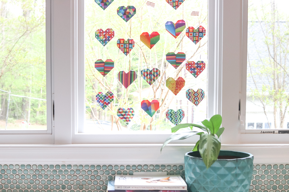 origami heart garland on window